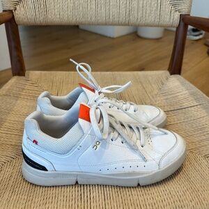 On Running White and Orange Women's Sneakers